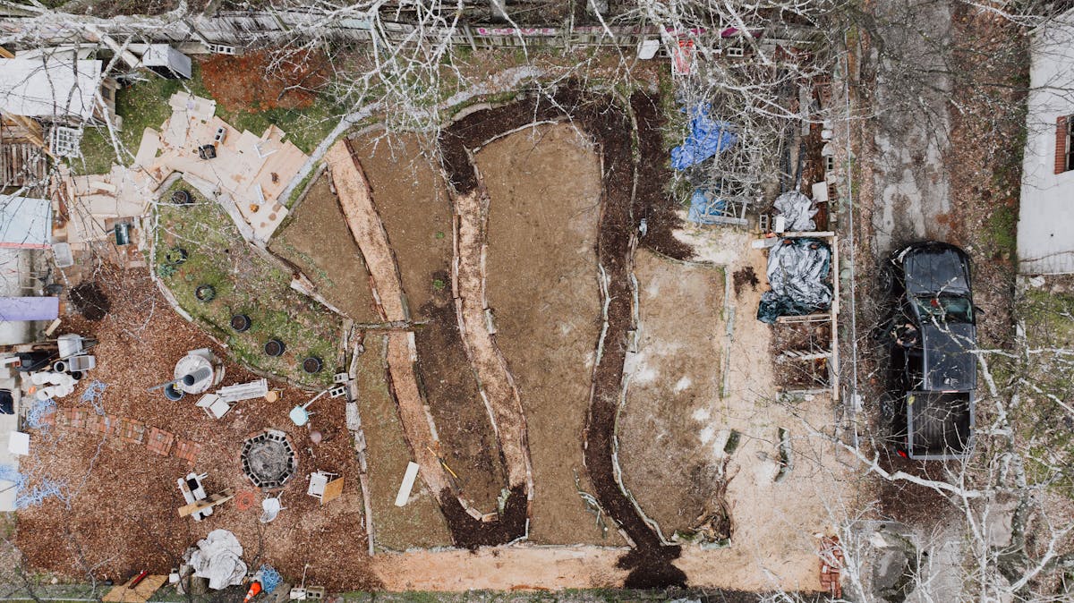 Before — in-ground pool prior to demolition by Glen & Dale Outdoor Services